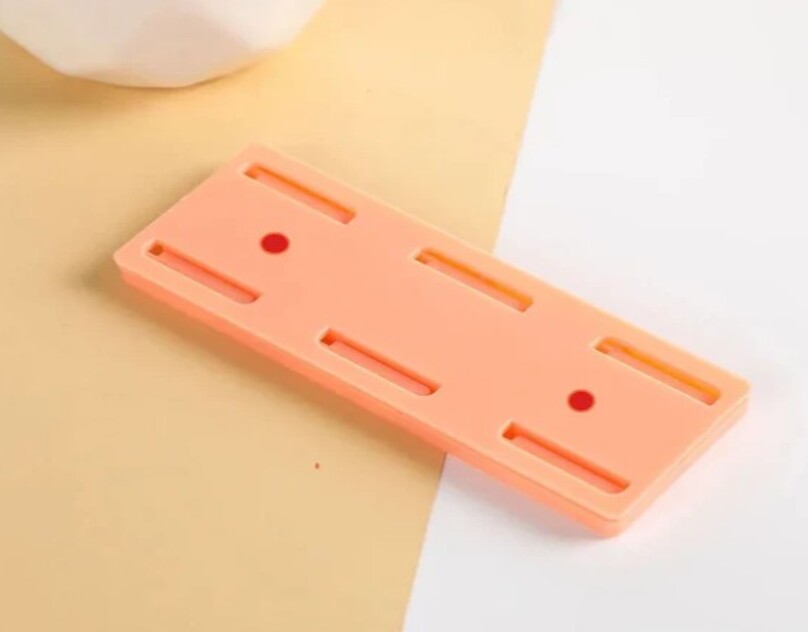 A Practical Accessory to Keep Cables and Power Strips Organized