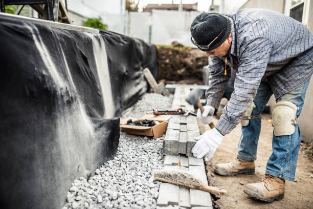 How New Retaining Wall Services Improve Backyard Safety