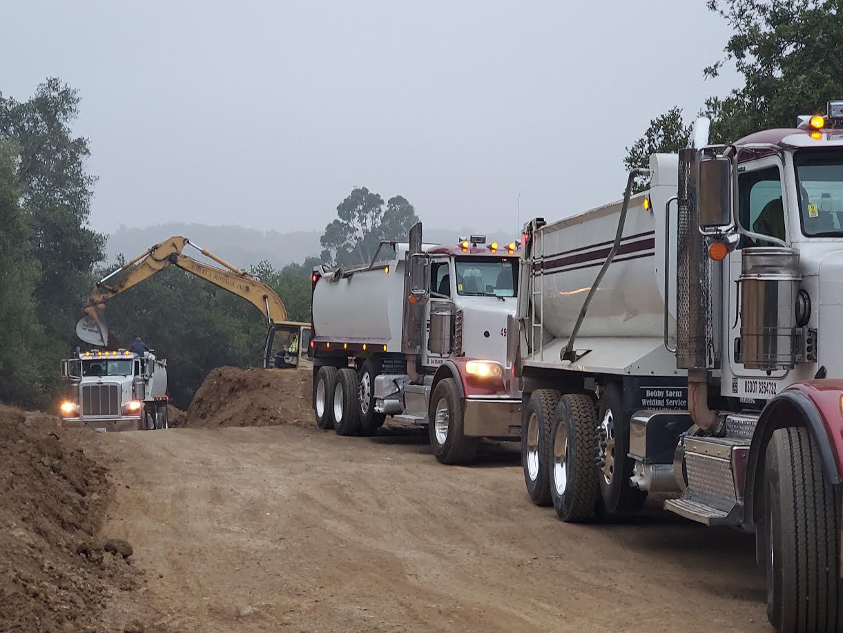 Dump Truck Tarping Made Easy: Tips for Safety and Compliance