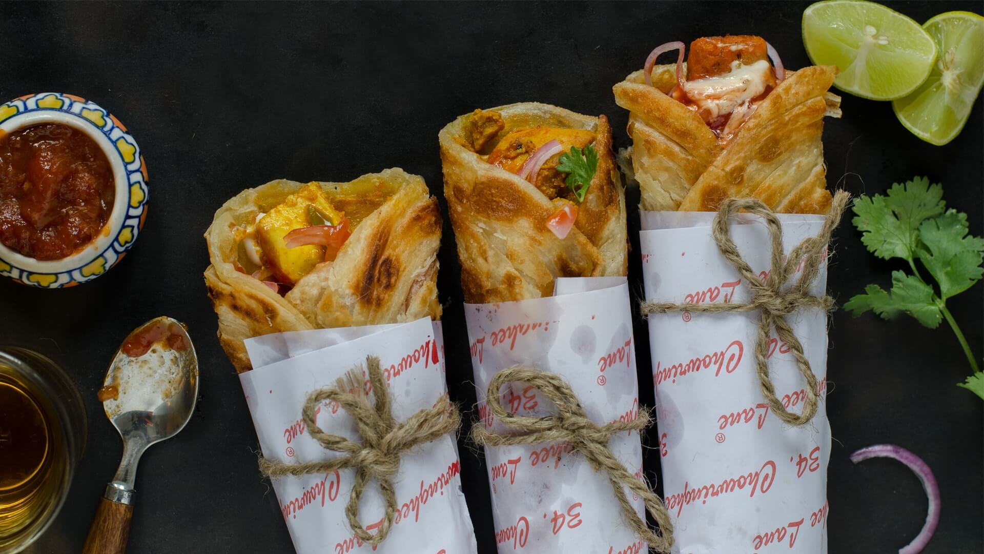 Get The Delicious Chicken Biryani & Chicken Roll in Noida @ 34chowringheelane