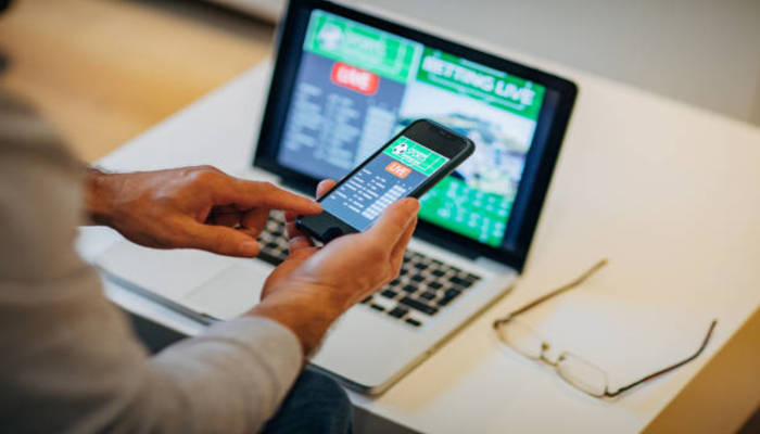 Is there any tricks of making money with sports betting?