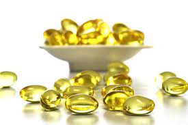 A multivitamin product used to prevent and treat vitamin deficiency by softgel capsules