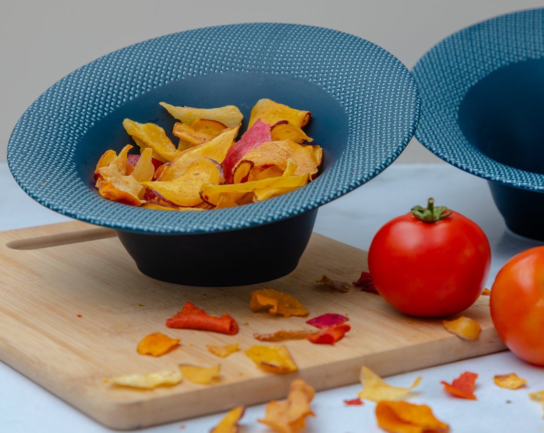 Order the exclusive Slanted Snack Serving Bowl from The Little Details.