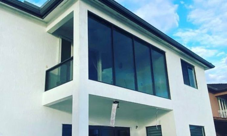 What are the benefits of installing Miami Dade hurricane-rated windows?