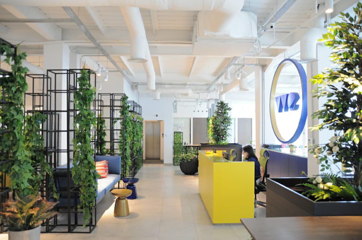 How can an office interior reflect a company's brand and culture?
