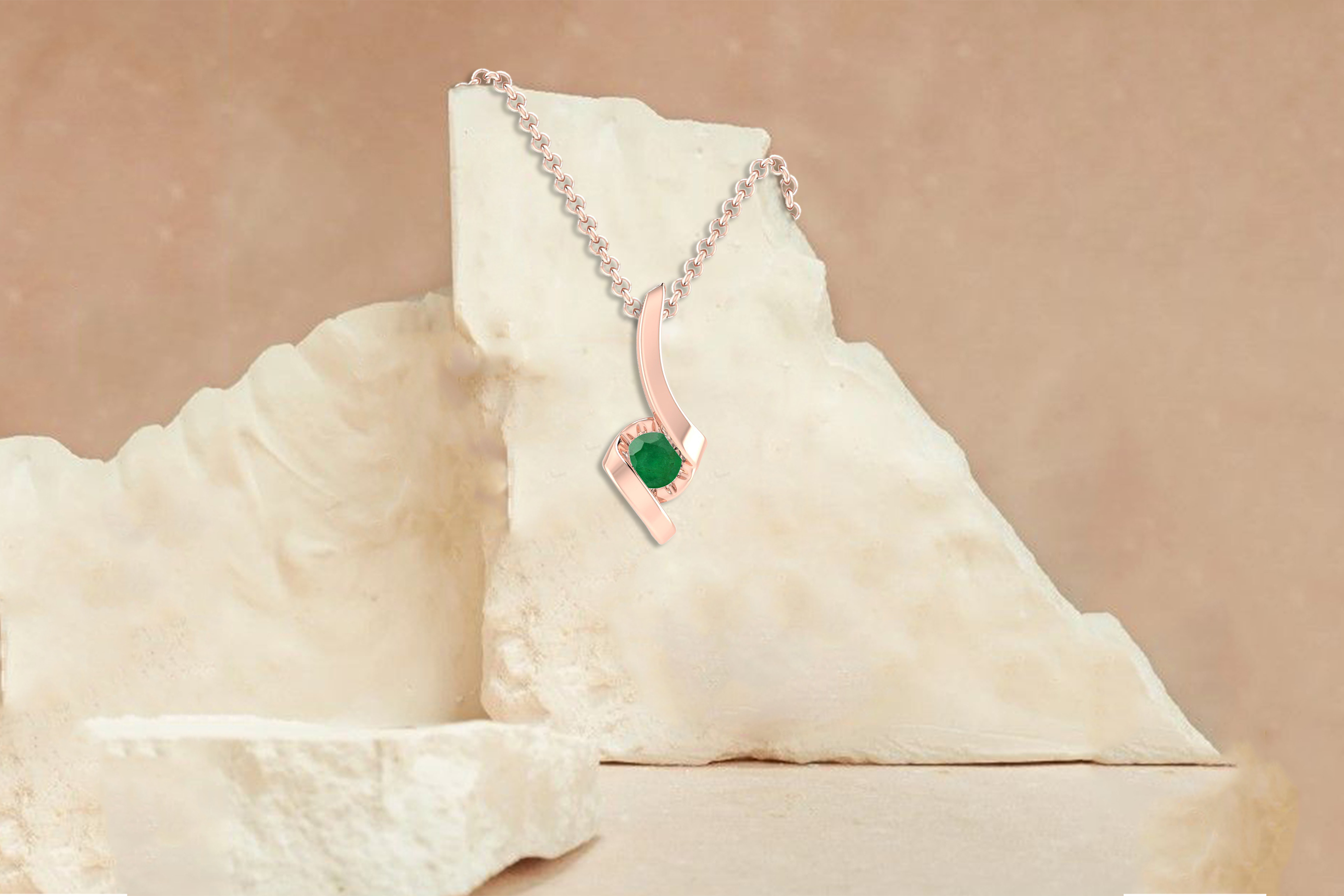 The Natural Emerald Pendant is an ideal complement to your attire.