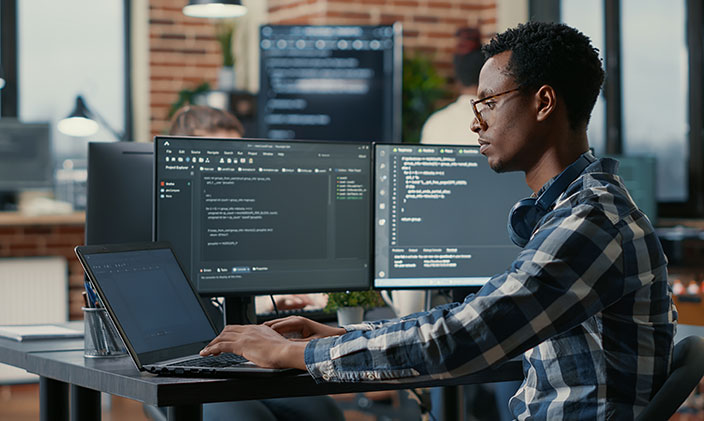 What are the Skills and Roles Required for Open Source Software Development and Management?