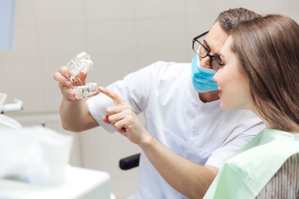 DENTAL IMPLANTS VS DENTURES: WHICH IS BETTER FOR YOU?