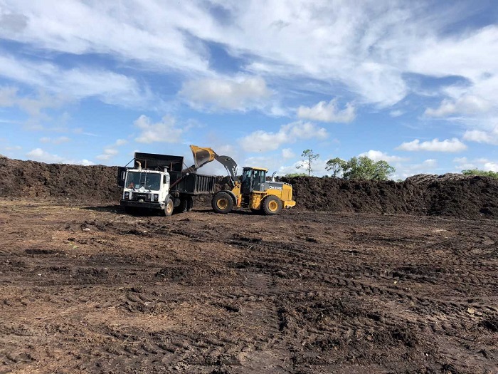 The Difference Between Topsoil and Compost
