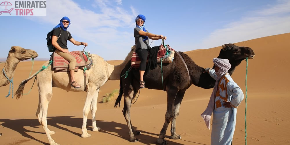 Desert Safari Dubai: Two 5-year-old Emiratis amid 11 Camel Riders