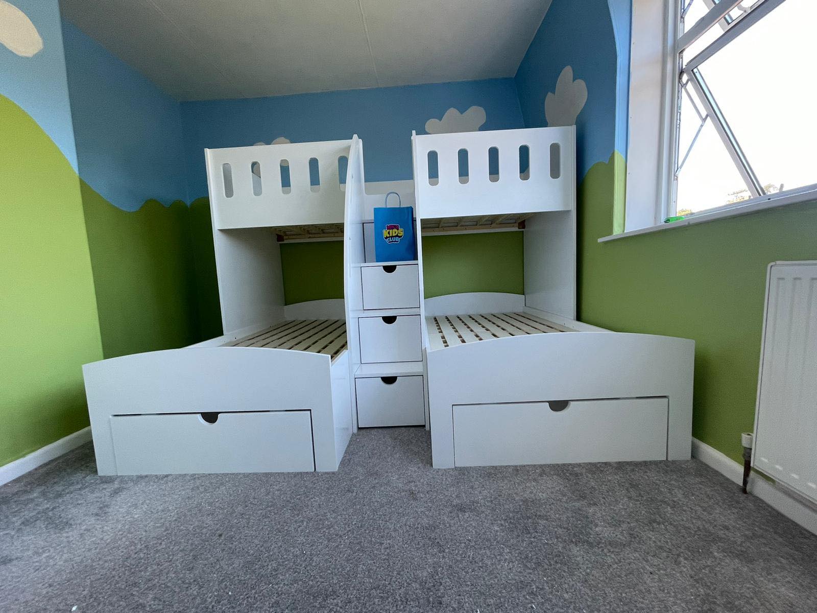 A stairway bunk bed is a space-saving option for smaller rooms