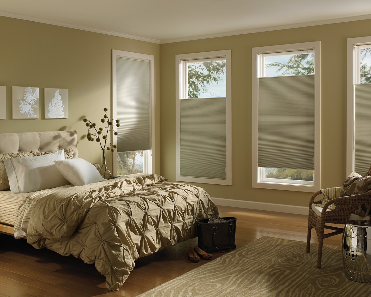 CREATE YOUR DREAM LIVING ROOM WITH THE PERFECT WINDOW COVERINGS.
