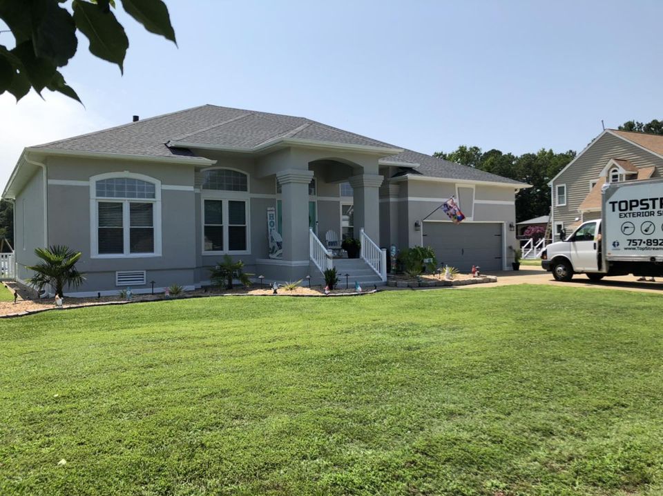 Top Stream Exterior Services: Fortifying Your Home with Seamless Gutters