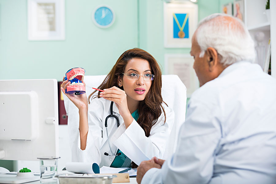 Choose between Dental Implant and Dental Bridge