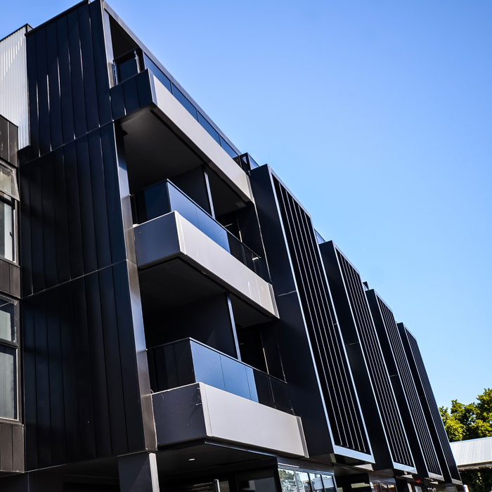 How Cladding Contractors Determine the Type of Cladding in a Property?