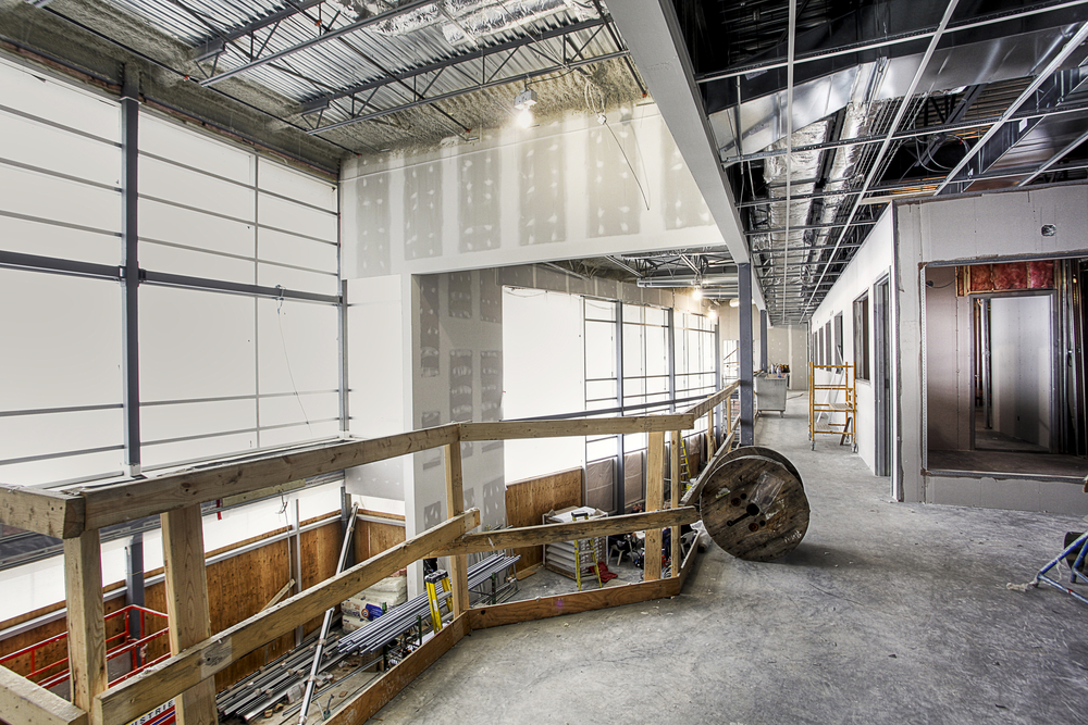 What are the advantages of engaging a professional building renovation contractor?