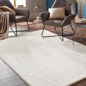 Create a warm and comfortable look with warm rugs