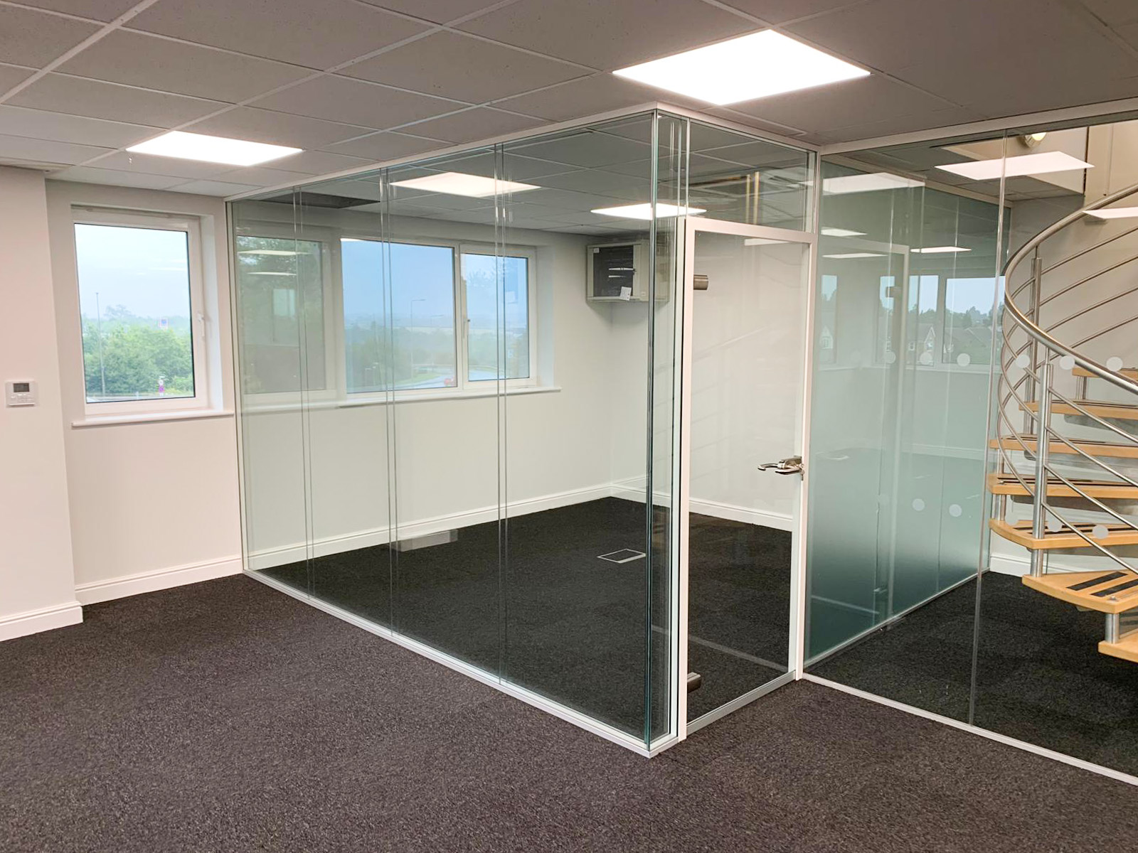 What are the common problems with glass partitions?