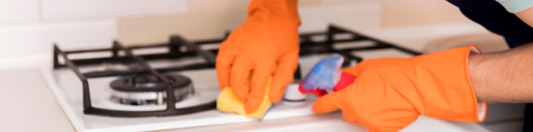 How do I clean my oven and stove top? 