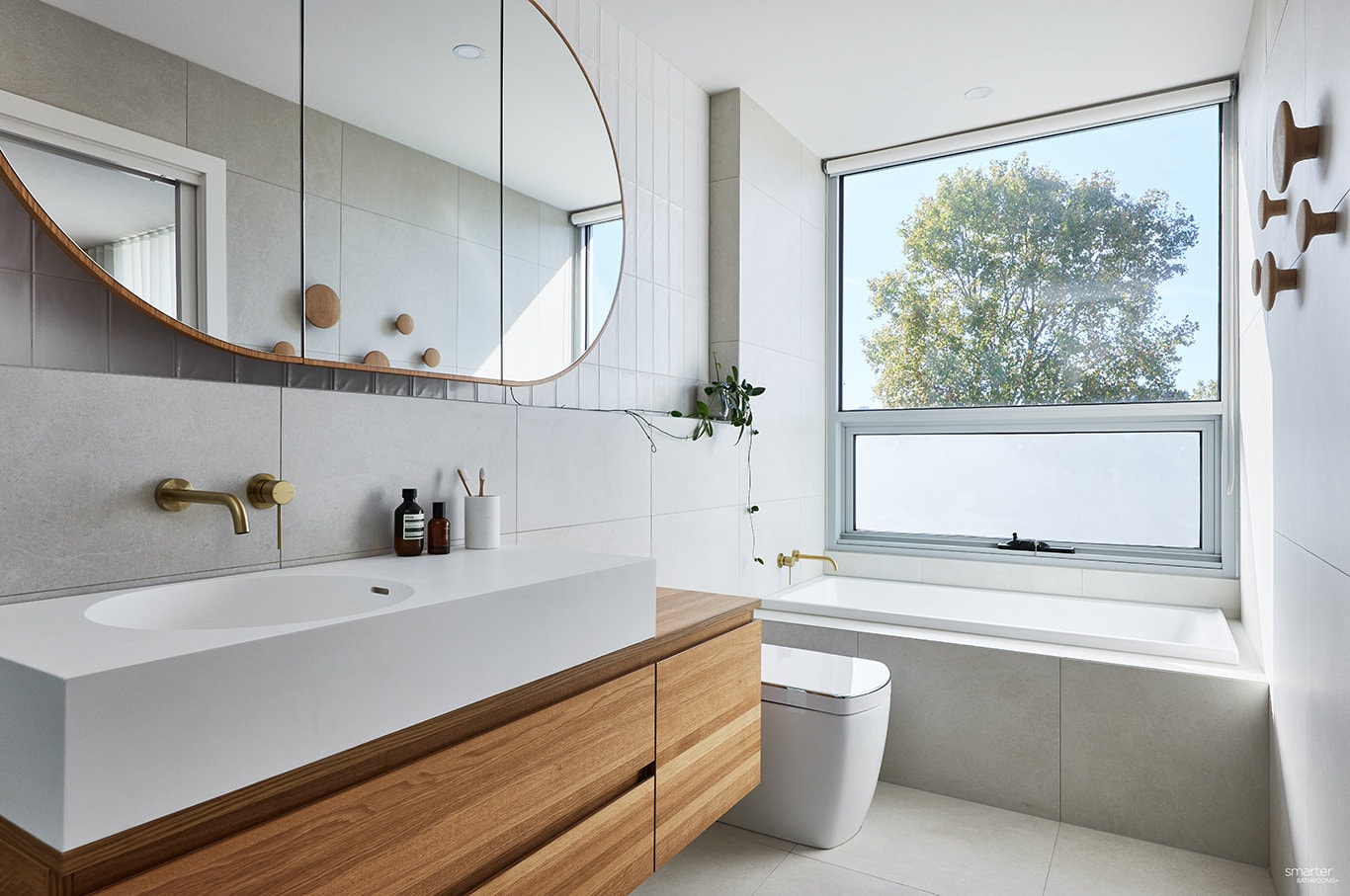 How can you transform a small bathroom into a spacious and functional space?