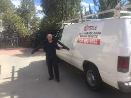 How to Calculate Garage Door Spring Replacement Costs Before Hiring a Pro