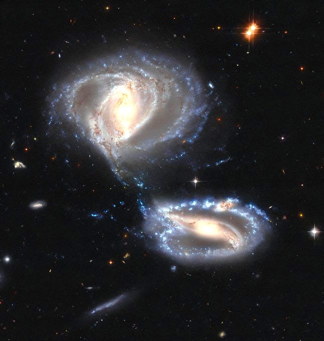 Dancing Galaxies: A Celestial Trio Unveiled in Tucana