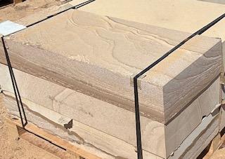Crafting Timeless Landscapes with Sandstone Retaining Wall