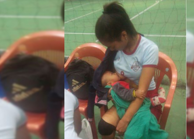 Mizoram volleyball player breastfeeds baby during half-time